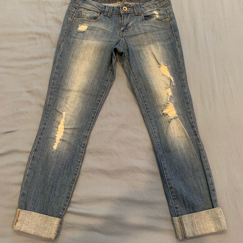 Distressed light wash jean